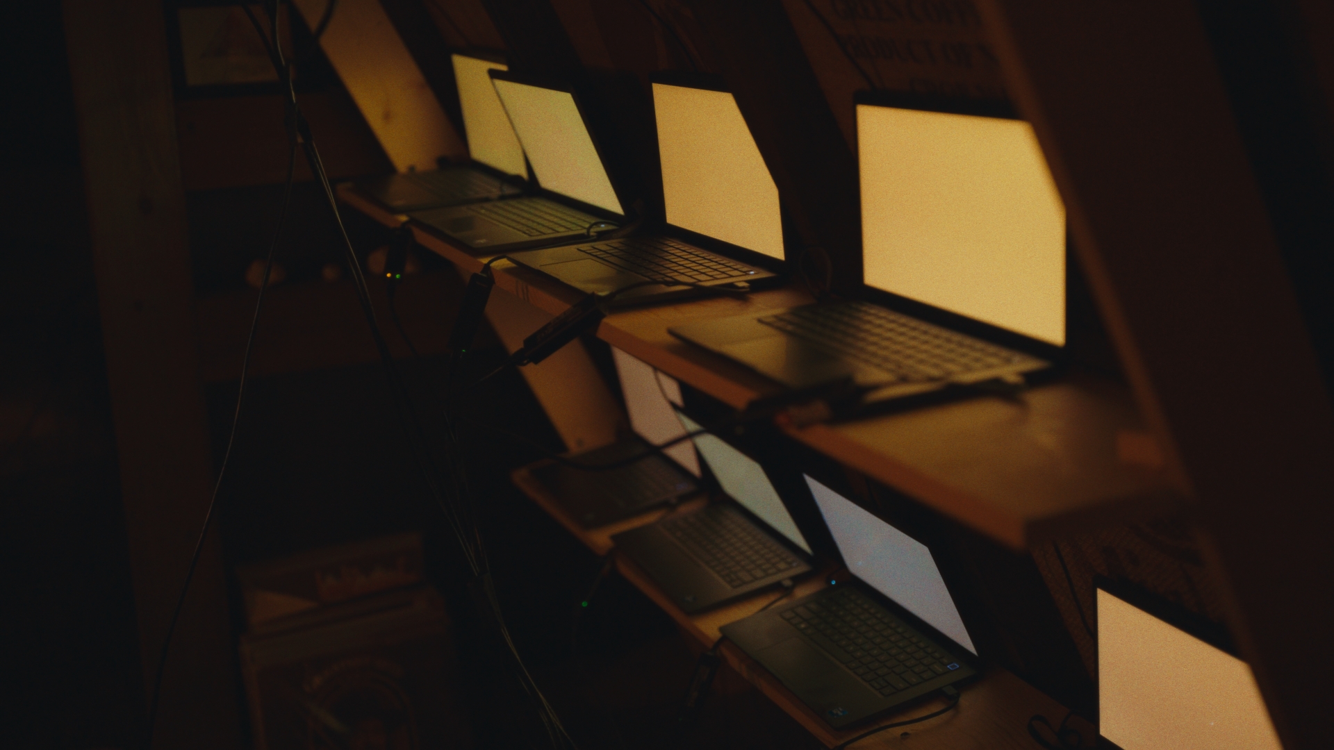 Laptops running Cascadia side by side on a shelf in the remote cabin.