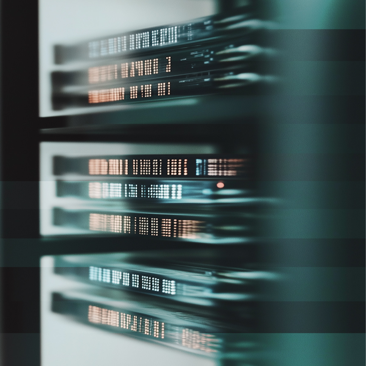 A rack of servers, status displays lit, receding into shallow focus.